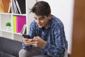 Teen with phone