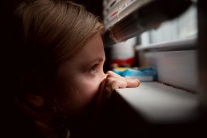 Child by the window